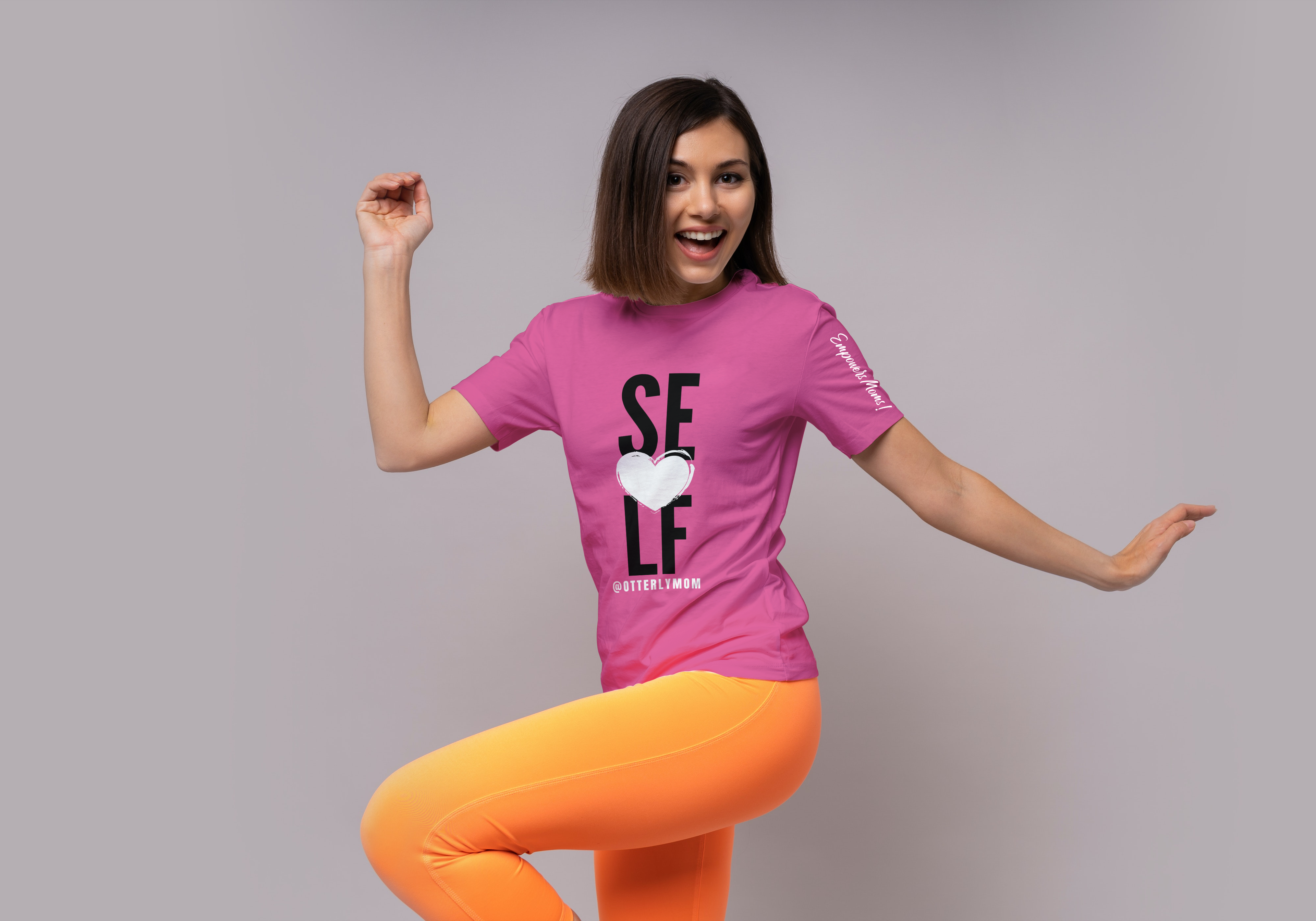 Woman wearing Self love Pink tshirt from Otterlymom